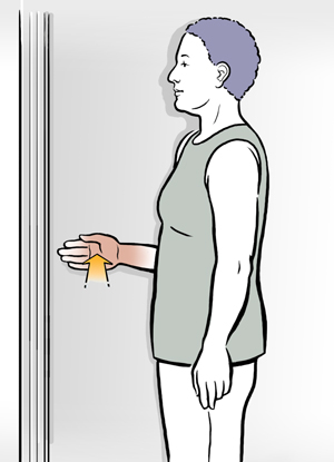 Woman doing external rotation shoulder exercise.